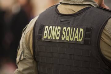 vest that reads "bomb squad"